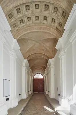 a hallway of a building with a large ceiling at Modern & Elegant, 3 min of Wenceslas Square in Prague