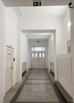 an elevator door in a building with glass at Chic Flat on Jecna Walk to Wenceslas Sq and Museum in Prague