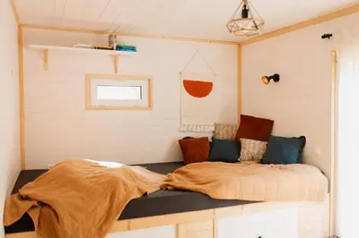 a bedroom with a bed in a room at Buňka Poteplí in Horní Bezděkov