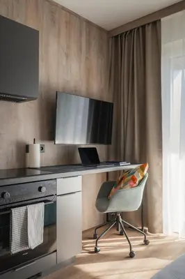 an oven with its door open in a kitchen at Avenue Apartments in Prague