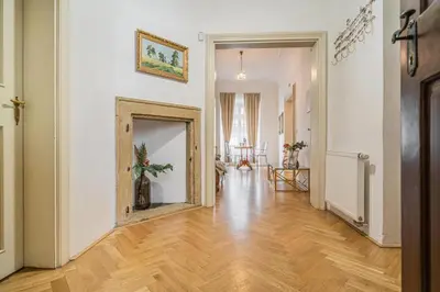a hallway with a mirror in the middle of a room at 2 Bed Flat - Sleeps 6 - Pets - Wifi in Prague