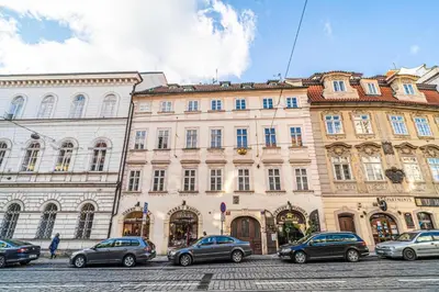 a large building with cars parked in front of it at 1 Bed Flat - Sleeps 3 - Pets - Wifi in Prague