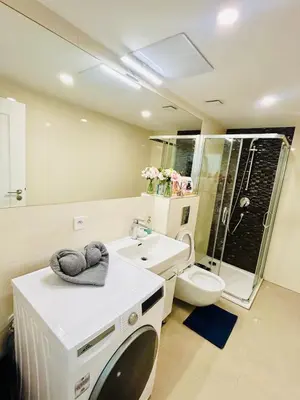 a bathroom with a sink and a toilet at New Design apartment right next Wenceslas Square in Prague