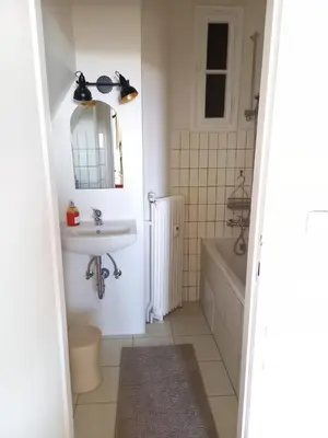 a bathroom with a sink and a mirror at Hezký apartman s balkonem in Prague