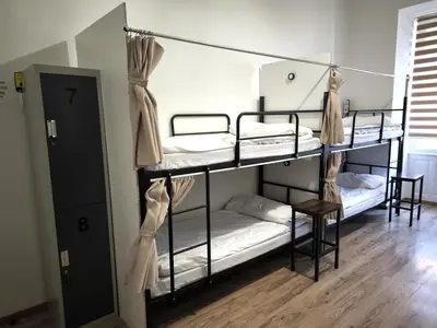 a bedroom with two bunk beds in a hostel at Hostel Relax in Prague