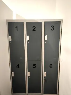 two lockers in a locker room with numbers on them at Hostel Relax in Prague
