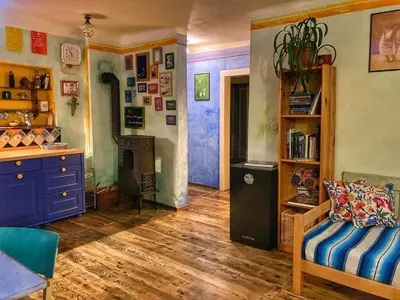 a living room with a couch and a table at Casa Mexico in Roztoky