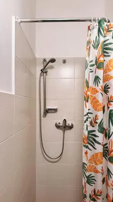 a bed in a room with two towels on it at Cozy Studio near City in Prague