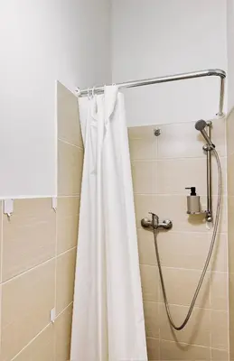 a small bathroom with a toilet and a sink at Cozy Studio near City in Prague