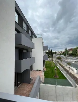 a view from the balcony of a white building at Bright & Cosy 1-Bedroom Apartment with Balcony in Prague