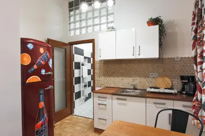 a kitchen with a refrigerator and a sink at Luxury 1 bedroom apartment in Central Prague in Prague