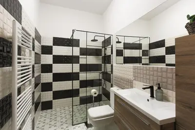 a bathroom with a toilet and a sink at Luxury 1 bedroom apartment in Central Prague in Prague