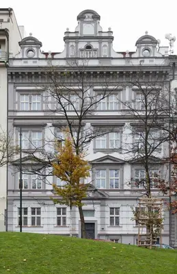 a large white building with a tree in front of it at Stylish 2BR with stunning view of National Muzeum in Prague
