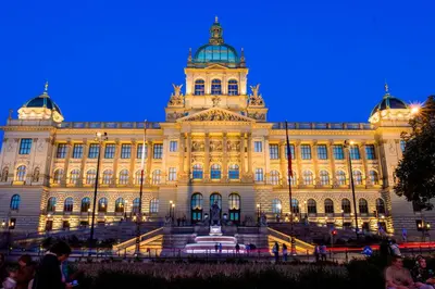 a large building with a fountain in front of it at The Wenceslas Square Terrace in Prague