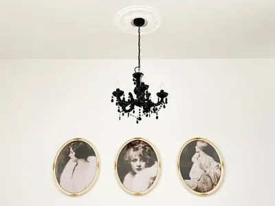 three mirrors on a wall with a chandelier at Vintage & Modern - best of both worlds in the heart of Prague in Prague