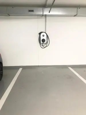 a white garage door with a soccer ball on it at Apartmantplus01 in Prague