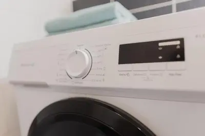 a close up of a washing machine at Apartment Mostecka in Prague