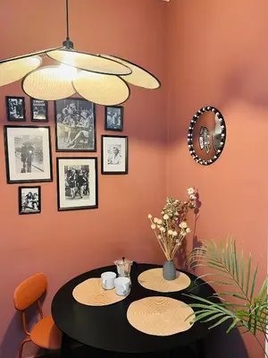 a dining room with a table with two chairs at Quiet and Cozy Apartment by the Walls of Vyšehrad in Prague
