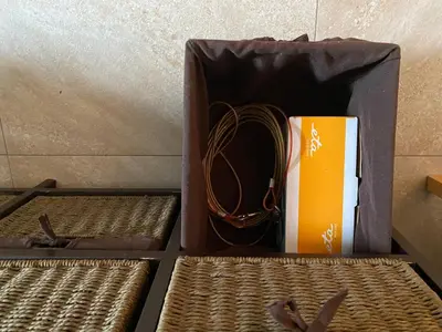 a box with a backpack sitting on a table at Country home Chez Nous U nas in Tetín