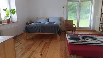 a kitchen with a table and a dining room at Ubytování Na Pěšině - Private Parking in Prague