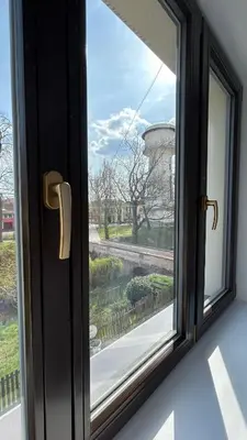 a window with a view of a water tower at VilaVala in Nymburk