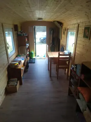a room with a table and a dining room at Maringotka Waldeck in Ohrazenice