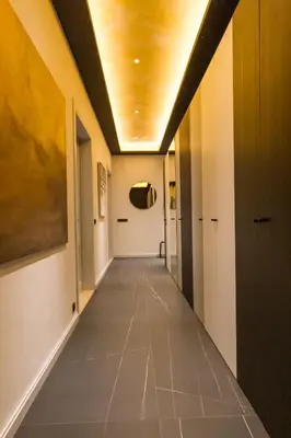 a hallway in a building with a ceiling at Florentinum Residence Prague Old Town in Prague