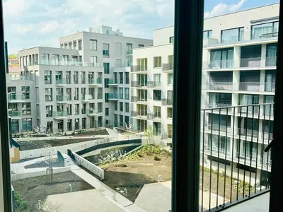 a view from a window of a building at New building New apartment at Andel Metro Station in Prague