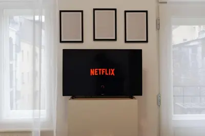a flat screen tv sitting on top of a wall at Blue Courtyard Retreat Quiet Green View in Prague