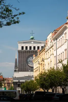 a large clock tower on top of a building at Prague Vinohrady Apartment in Prague