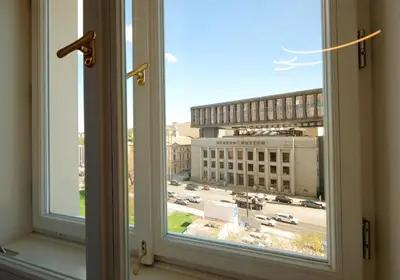 an open window with a view of a city street at Luxemi Apartments I Wenceslas Square in Prague