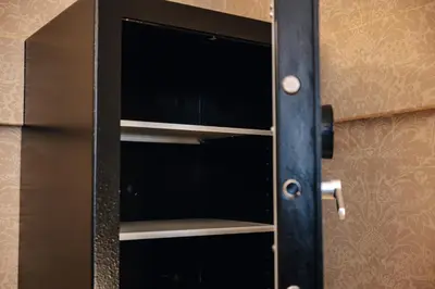 ajar door of a black cabinet in a room at WagnerStays Grand Nest 6BD Billiard&Sauna&Cinema in Prague