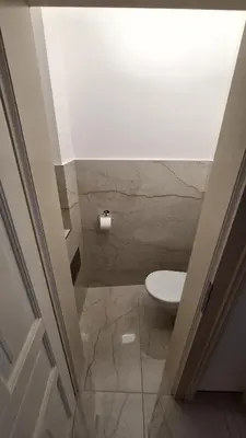 a bathroom with a toilet and a ceiling at City center apartment Thomas No3 in Prague
