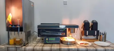 a kitchen counter with a coffee maker and a toaster at Zlatý pokoj v centru Prahy B1 in Prague