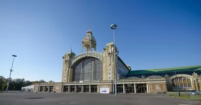 a large building with a clock tower on top of it at Soukromý pokoj v centru C2 in Prague