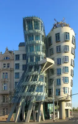 a building with a sculpture in front of it at Soukromý pokoj C3 v centru Prahy in Prague