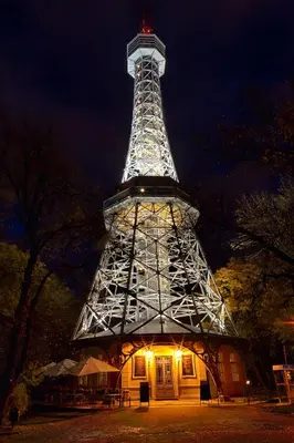 a lit up eiffel tower at night at Cool room on Letná D1 in Prague