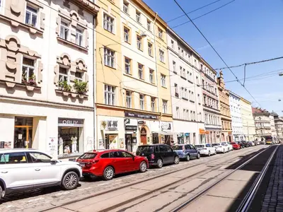 a row of cars parked on a city street at Nice room E3 Prague 7 in Prague