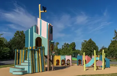 a playground with a colorful play structure at Glamping Prokop in Prague