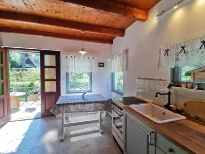 a kitchen with a sink and a counter top at fairy tale cottage on water stream, 30 minutes from South Prague in Davle