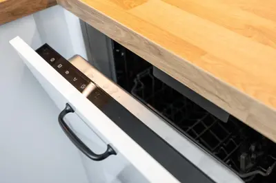 a close up of an oven with its door open at Peaceful and cosy newly built studio with parking in Prague