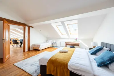 a bedroom with a large bed in a room at Apartment with terrace in Prague Center in Prague