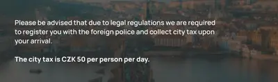 a screenshot of a webpage with a city in the background at Apartment with terrace in Prague Center in Prague