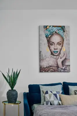 a painting of a woman sitting on a couch at Residence Kobrova with free parking in Prague