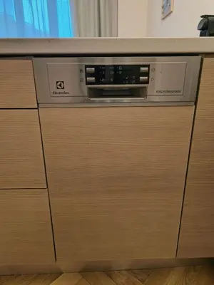 a microwave oven sitting on top of a cabinet at Sunny apartment in Prague
