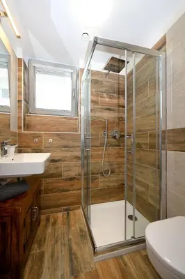 a bathroom with a shower and a sink at New Apartment in Heart of Prague in Prague
