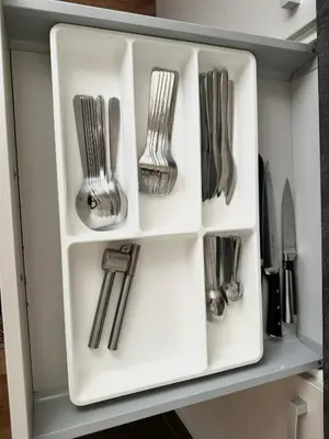 a drawer filled with utensils on a shelf at 2BR Gateway on the Rybna in Prague