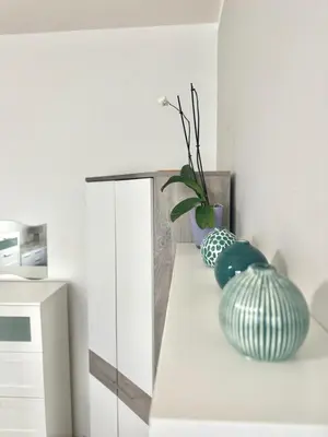 two vases sitting on a counter in a kitchen at 2BR Gateway on the Rybna in Prague