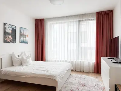 a car parked in front of a building at REAL Living by REFA Karlin 408 in Prague