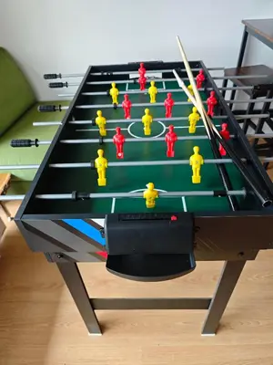 a ping pong table with yellow legos on it at Family, party Apartament in Prague